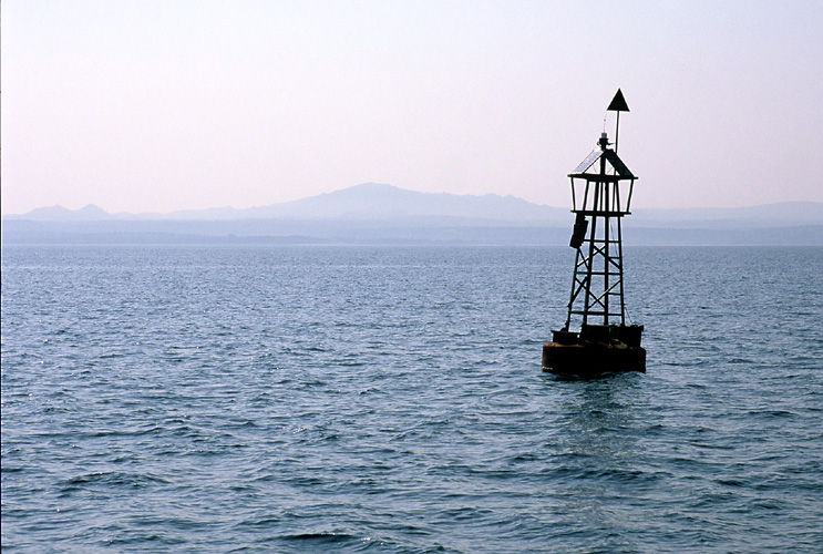 [Photo of PV-powered navigational buoy, off coast of island of Bozcaada, Turkey.]